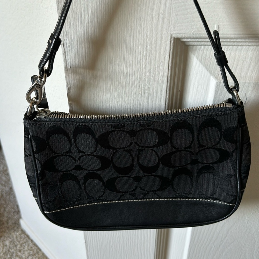 Coach black purse super cute.